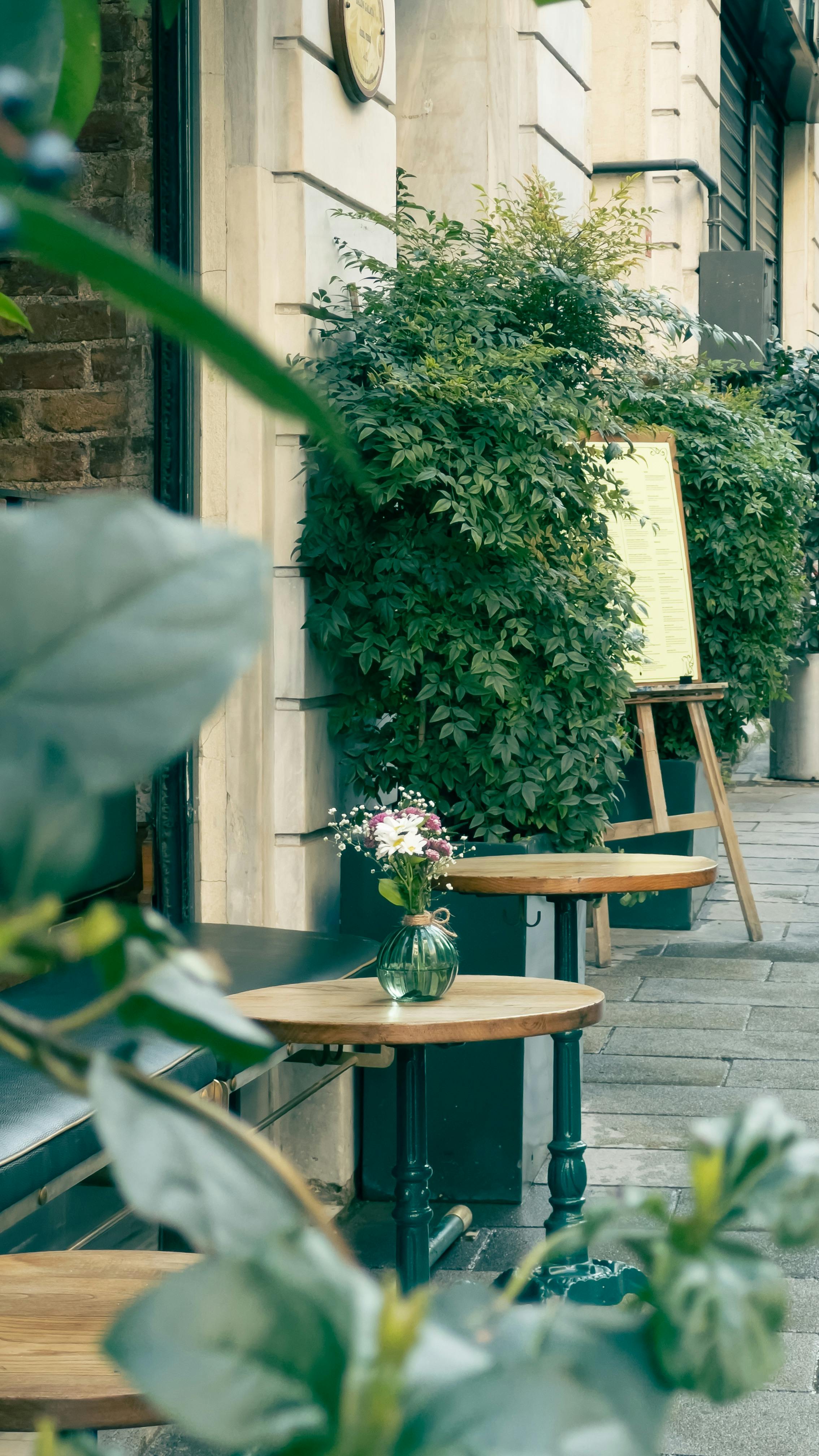 charming outdoor cafe seating with floral decor