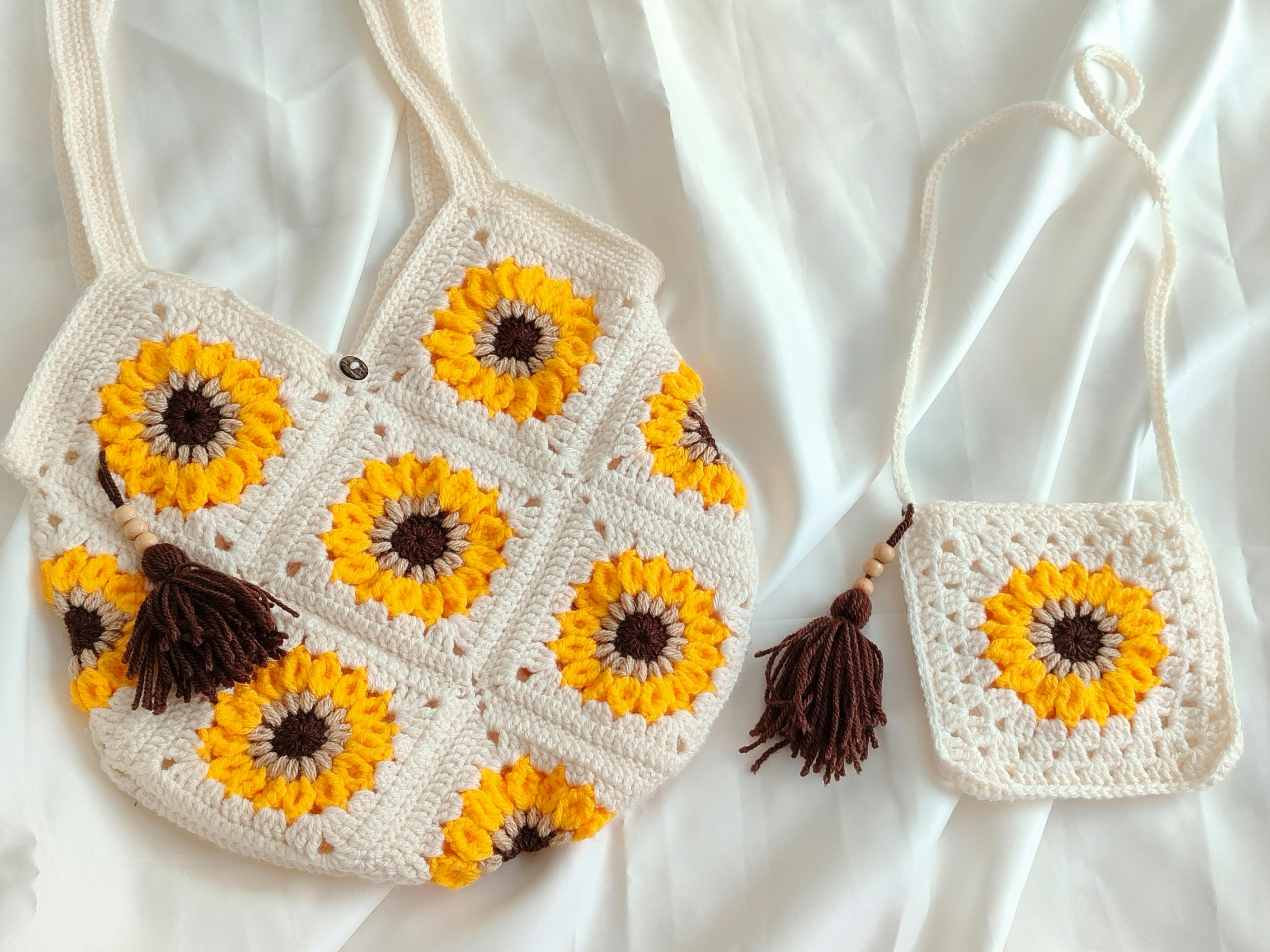 Elegant crochet bags featuring vibrant sunflower patterns. Perfect for fashion enthusiasts.