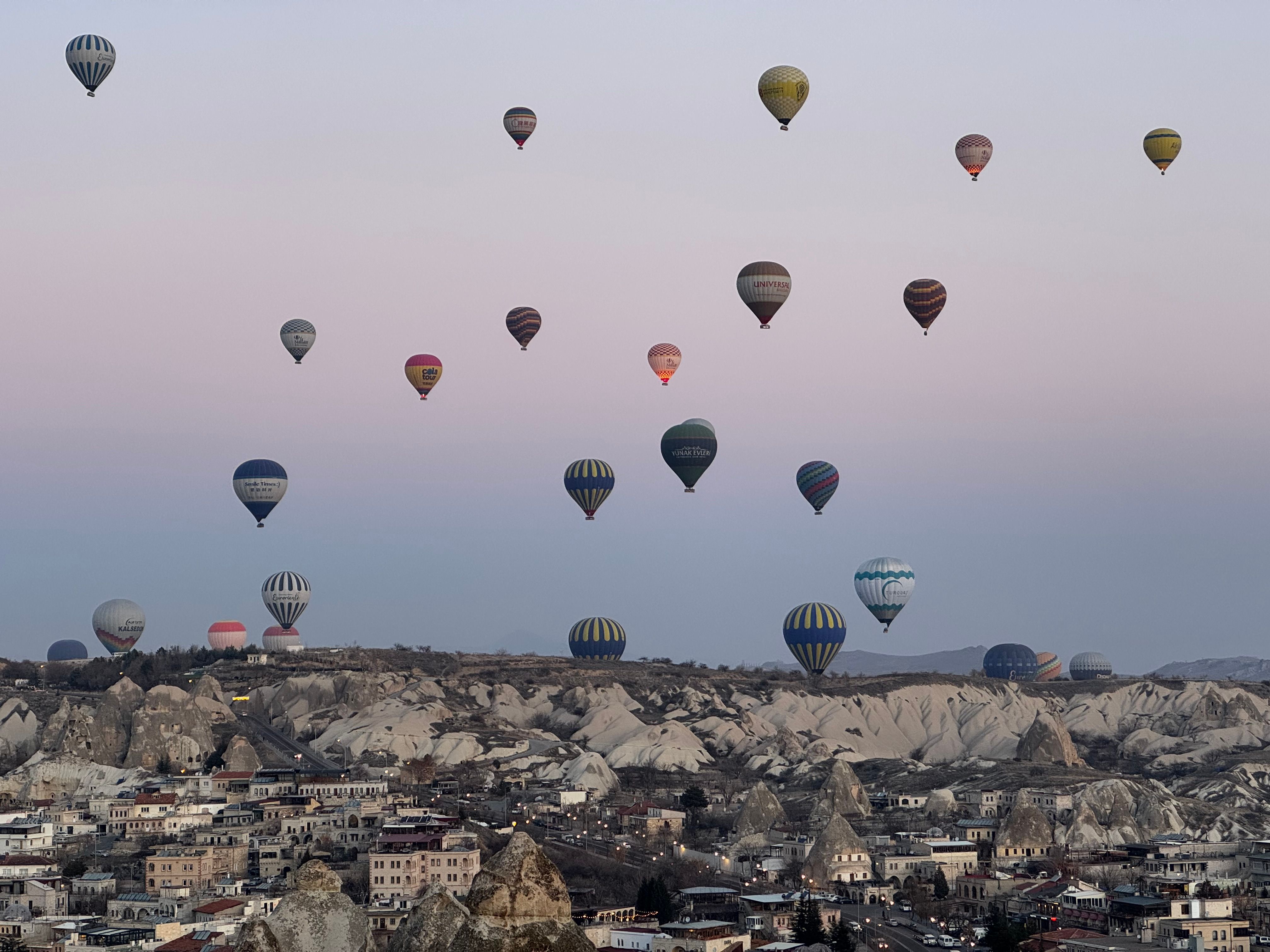 Hot Air Balloons Over Cappadocia at Sunrise · Free Stock Photo