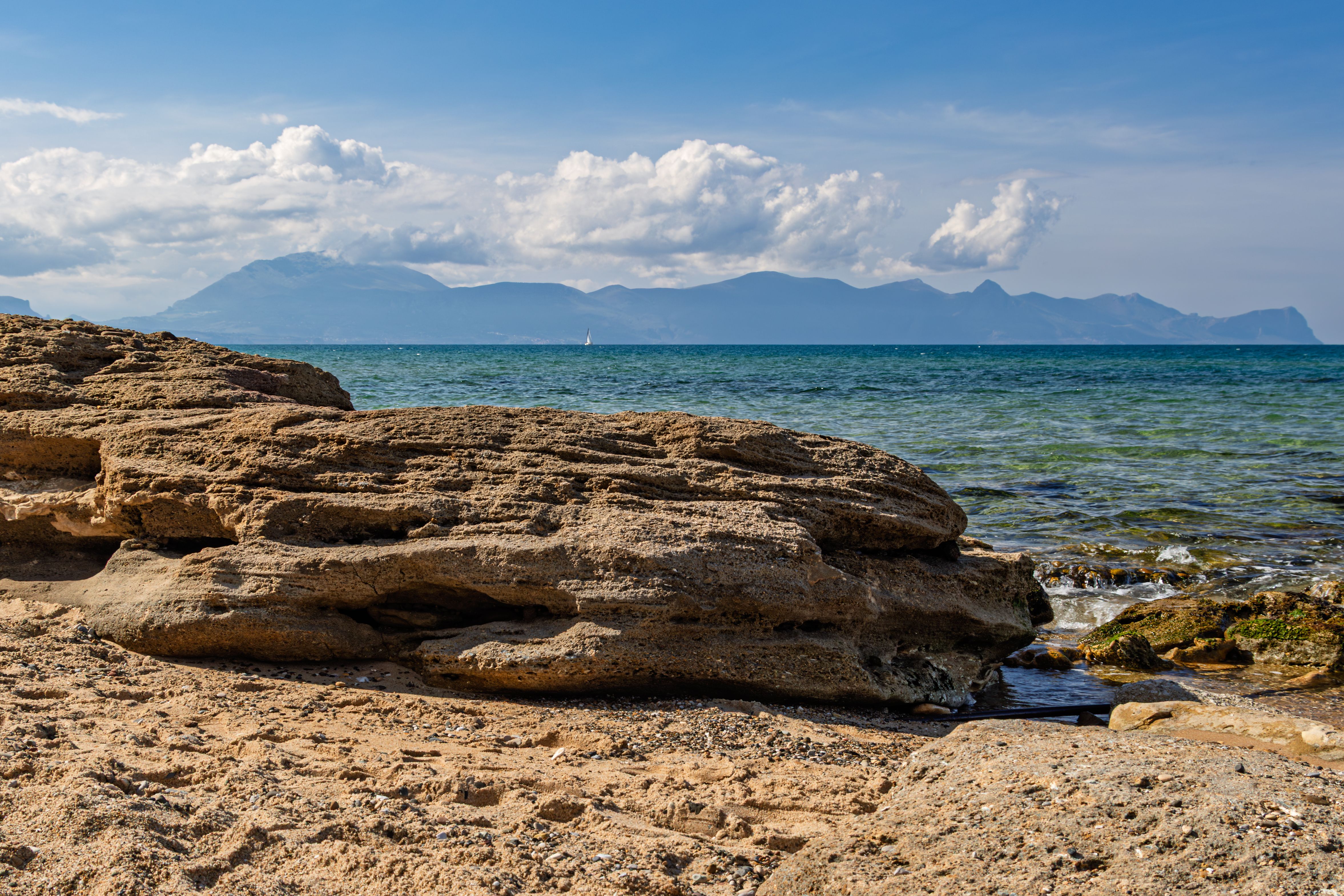 Explore the rocky beaches of Palermo, Sicily overlooking the Mediterranean Sea.