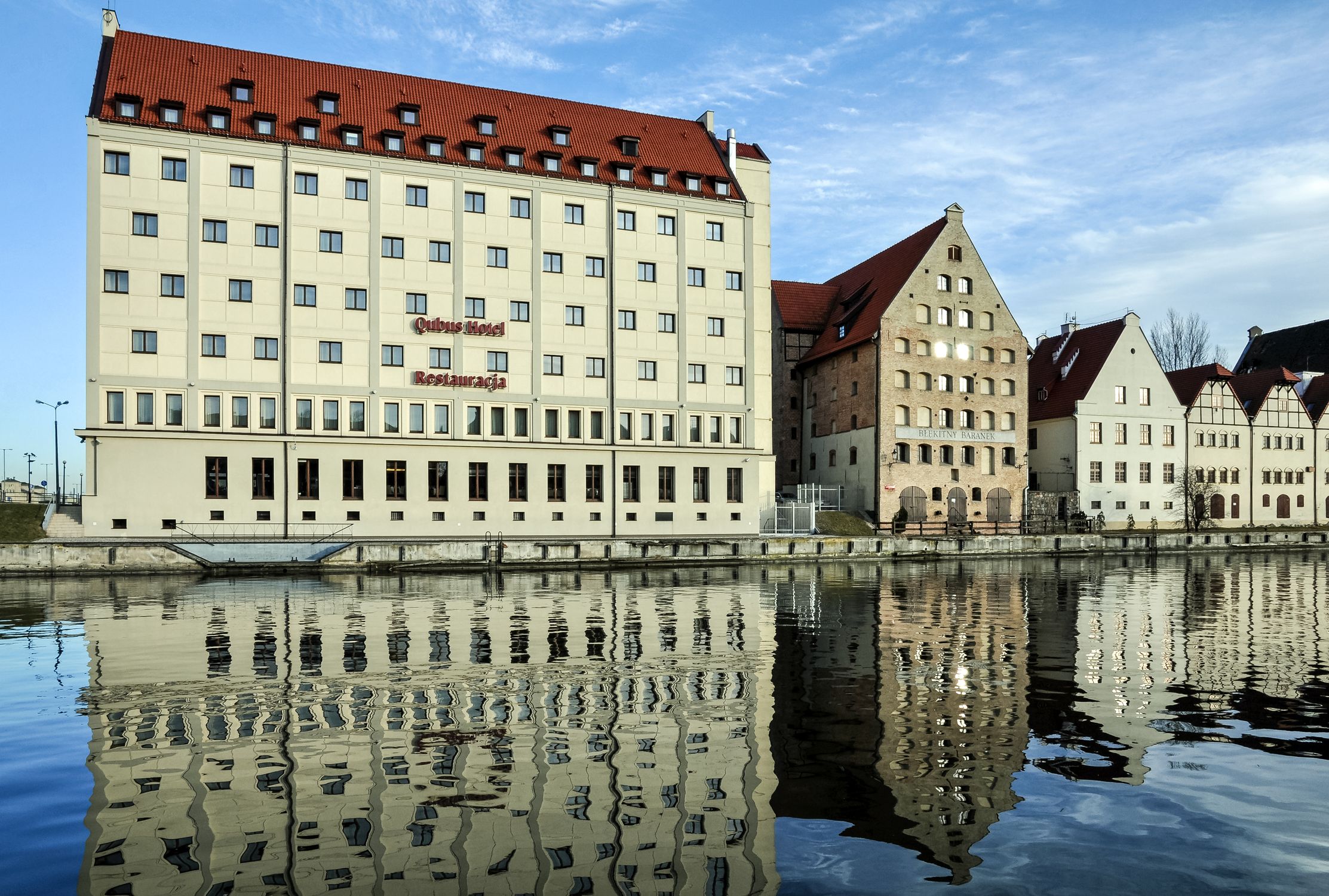 Captivating view of Danzig's old town architecture mirrored in the river.