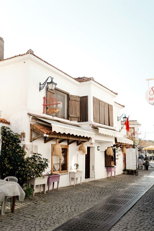 Free Quaint street scene in Sığacık, showcasing traditional Turkish architecture. Stock Photo