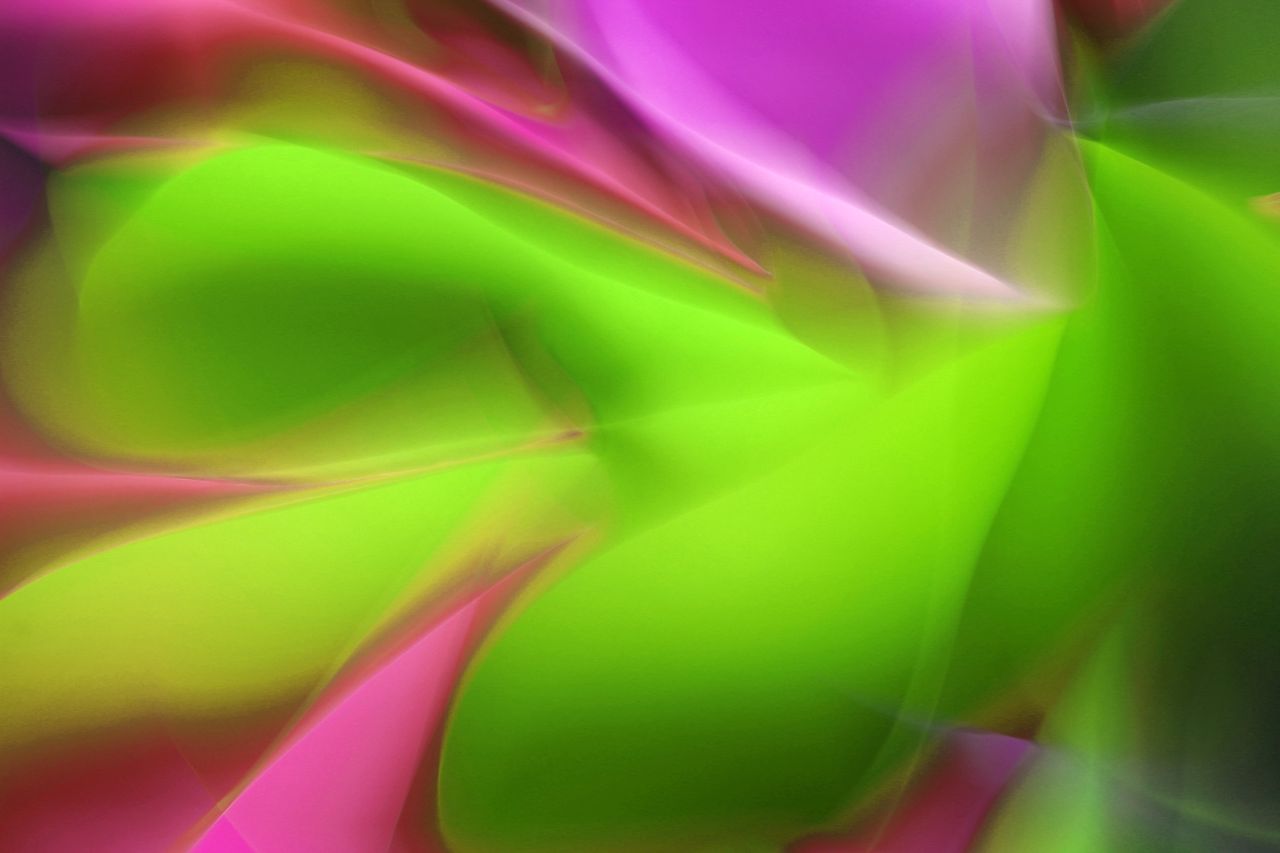 a vivid abstract composition featuring vibrant green and pink flowing