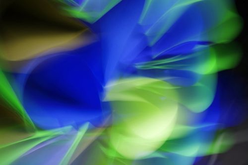 Free Abstract composition with dynamic blue and green swirls creating a vibrant visual effect. Stock Photo