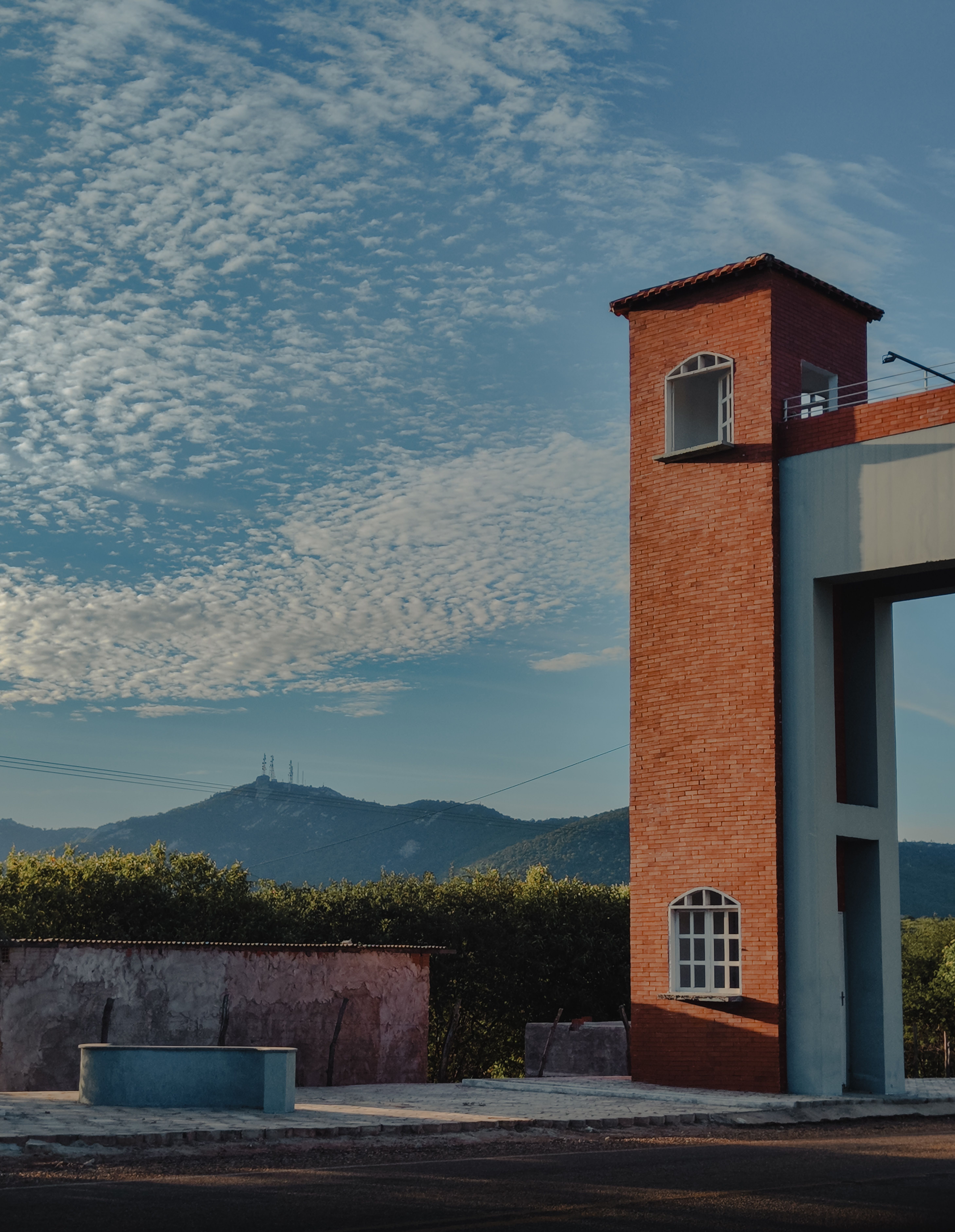 Rustic Brick Tower with Mountain View · Free Stock Photo