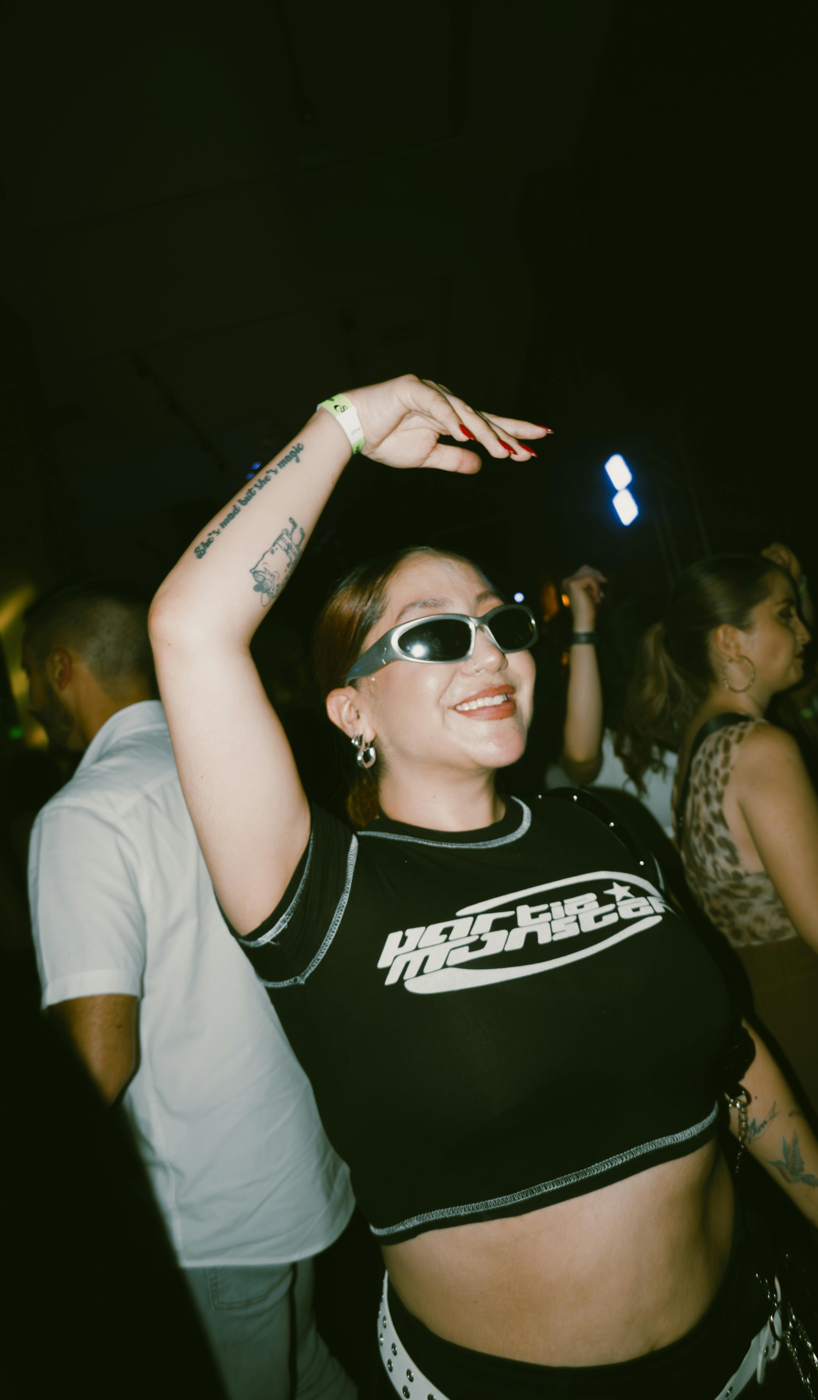 Free Energetic young adults dancing and enjoying nightlife at a club in Cuenca, Ecuador. Stock Photo