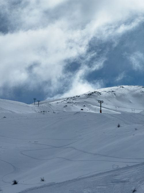 Free Pristine snow-covered hills under a dramatic sky in Sivrice, Elazığ, Türkiye. Stock Photo