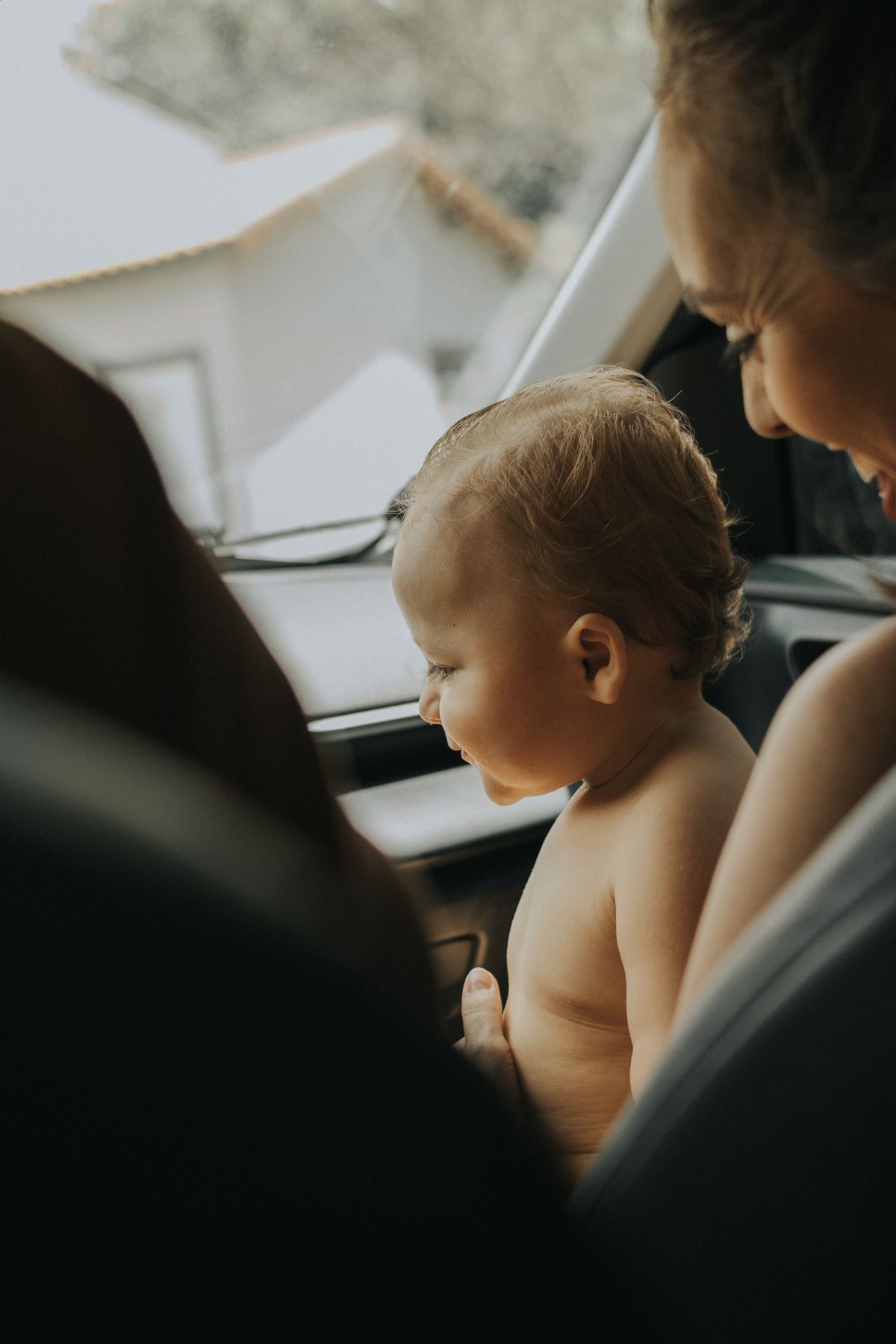 Mother and child enjoying a car journey playing road trip games for kids