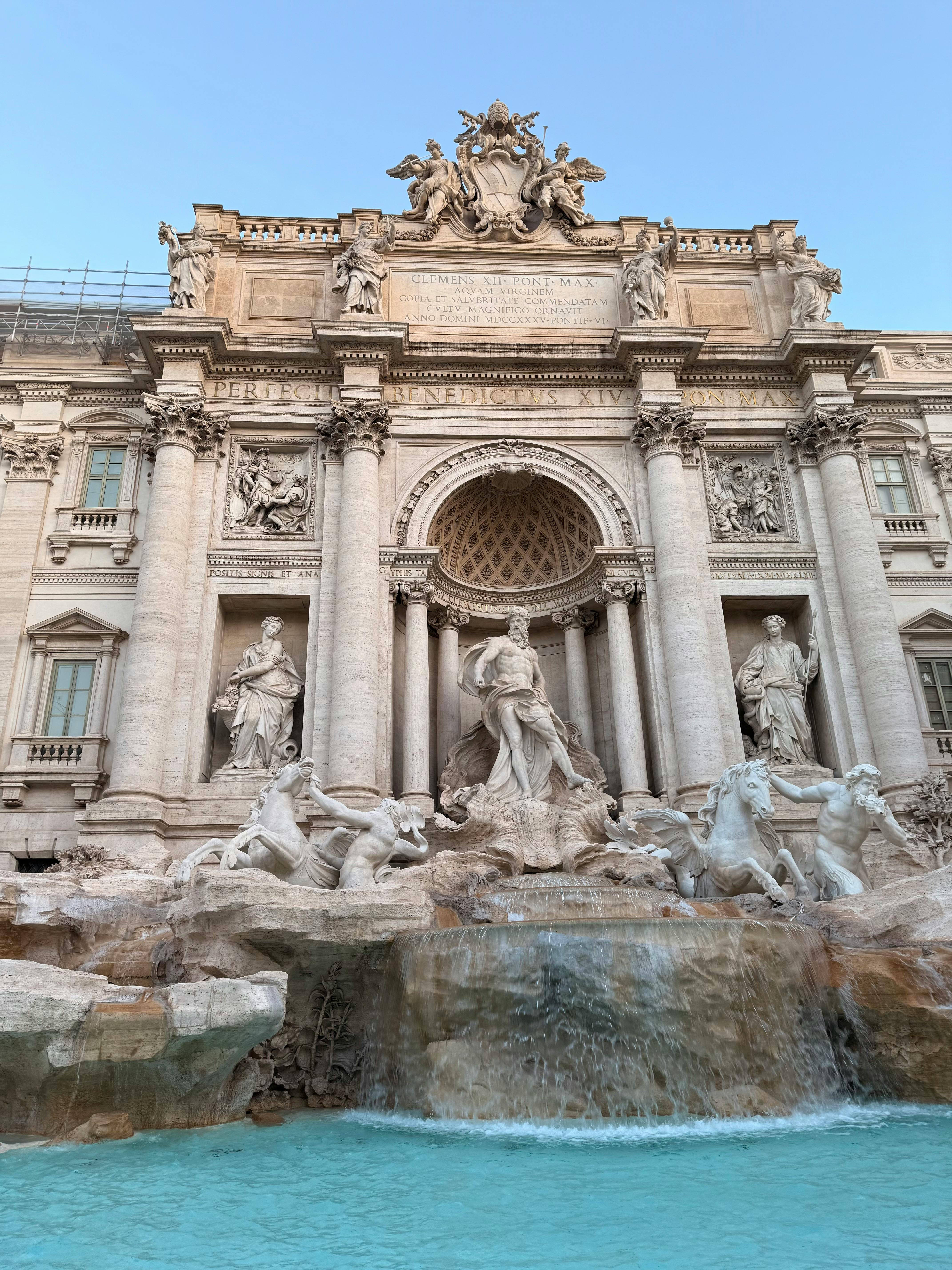 Stunning view of the historic Trevi Fountain in Rome, capturing its baroque architecture and cascading waters.