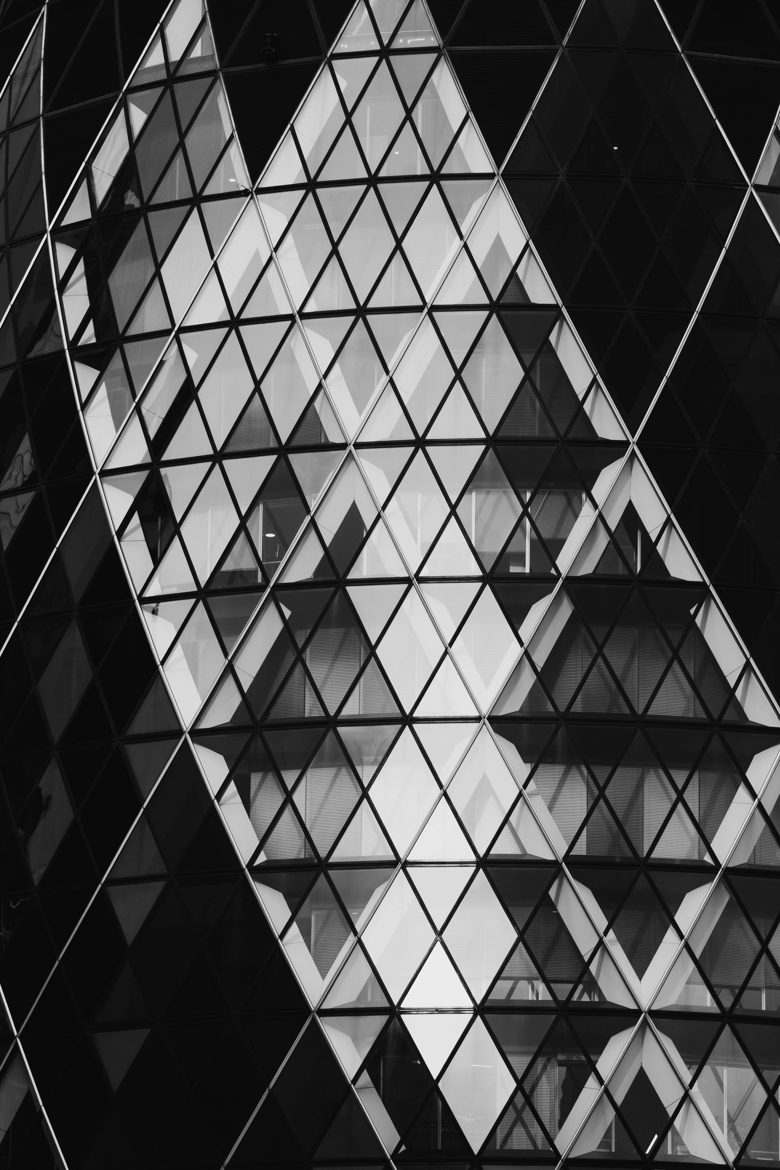 Black and white abstract view of the Gherkin's geometric patterns.
