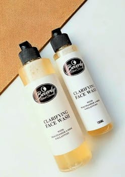 Twin bottles of Beverly clarifying face wash with niacinamide and allantoin.