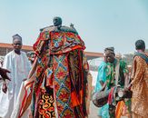 Colorful Nigerian festival showcasing traditional attire and cultural heritage.