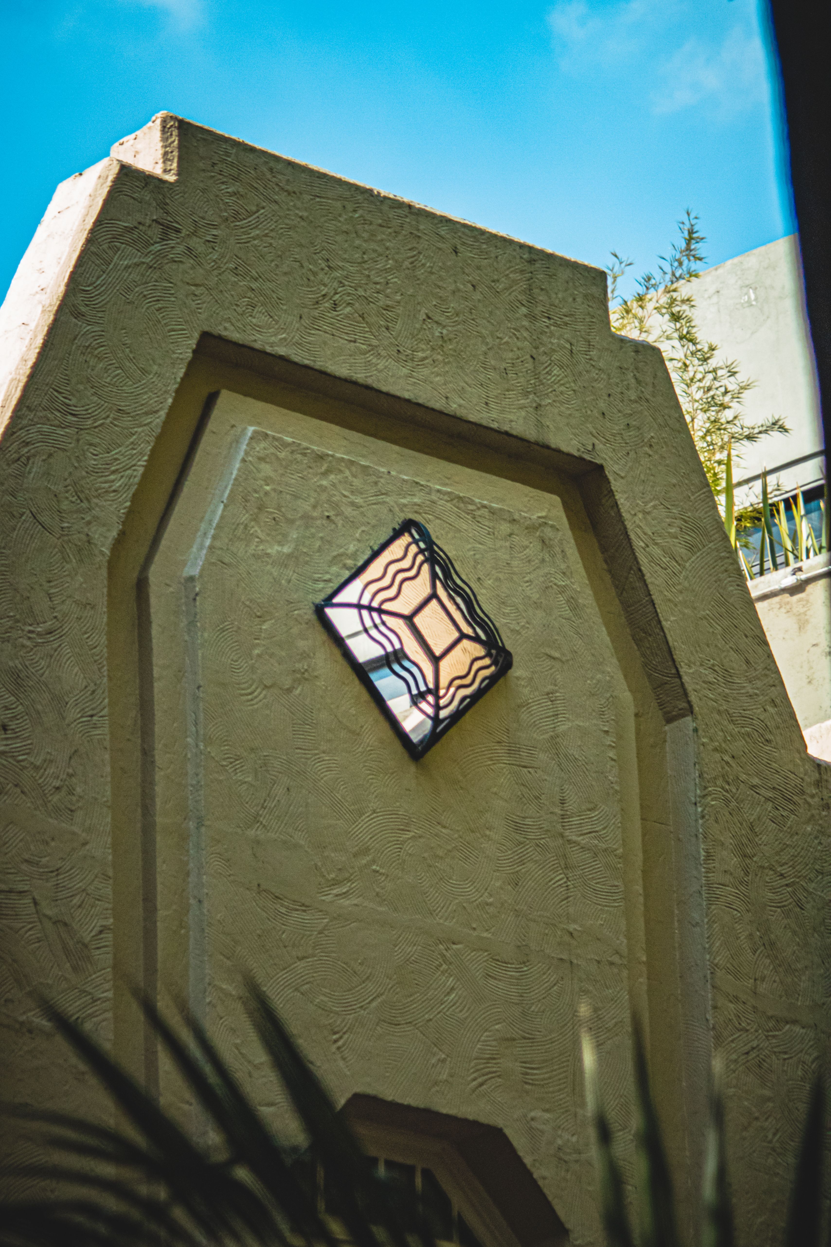 Elegant Mexican Architecture Featuring Abstract Window · Free Stock Photo