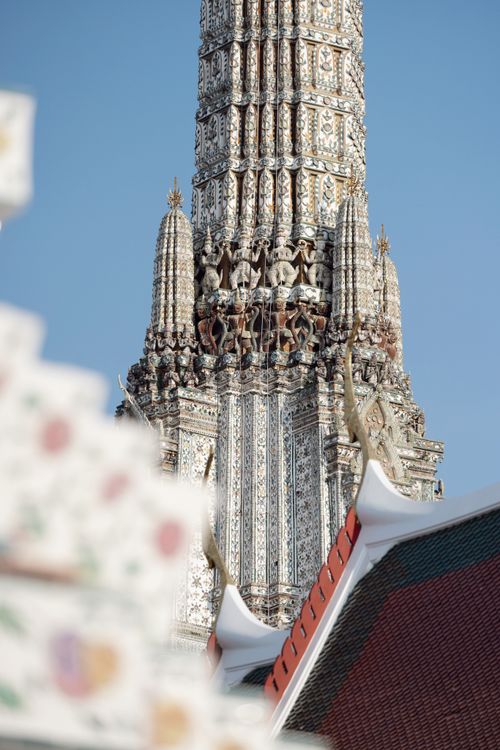 Free Detailed view of the ornate spire of Wat Arun, a famous temple in Bangkok. Stock Photo