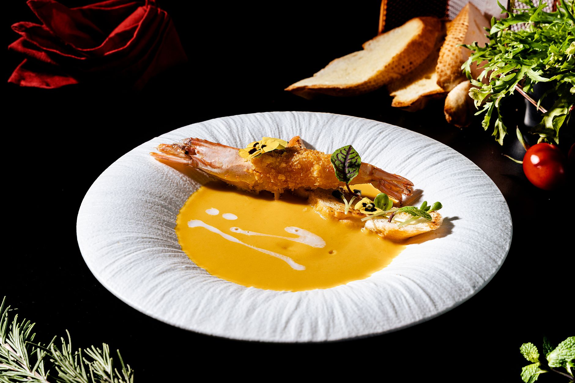 Various bowls of soup with different textures and colors