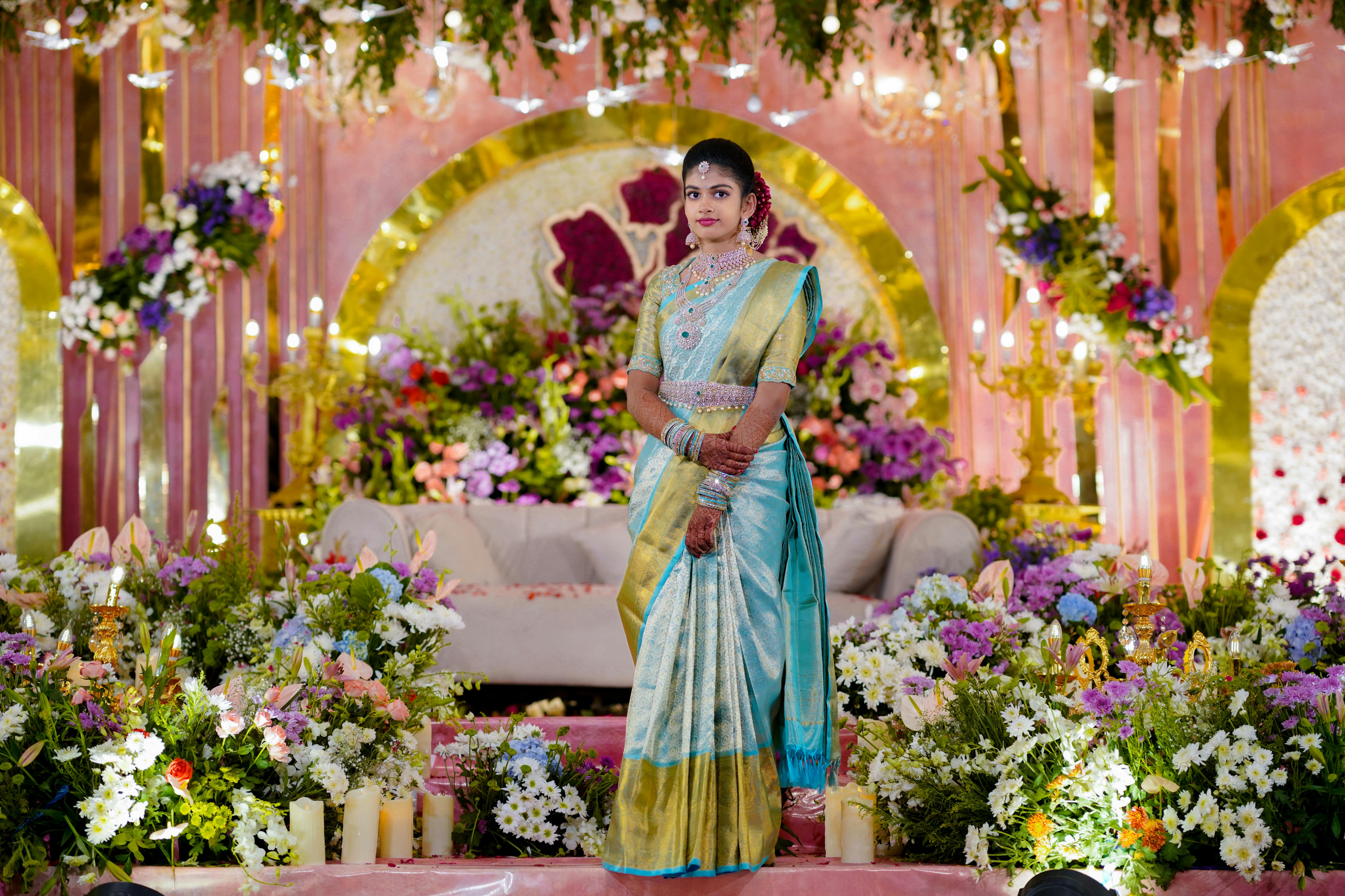 Beautifully decorated wedding with a bride in traditional attire in Hyderabad, India.