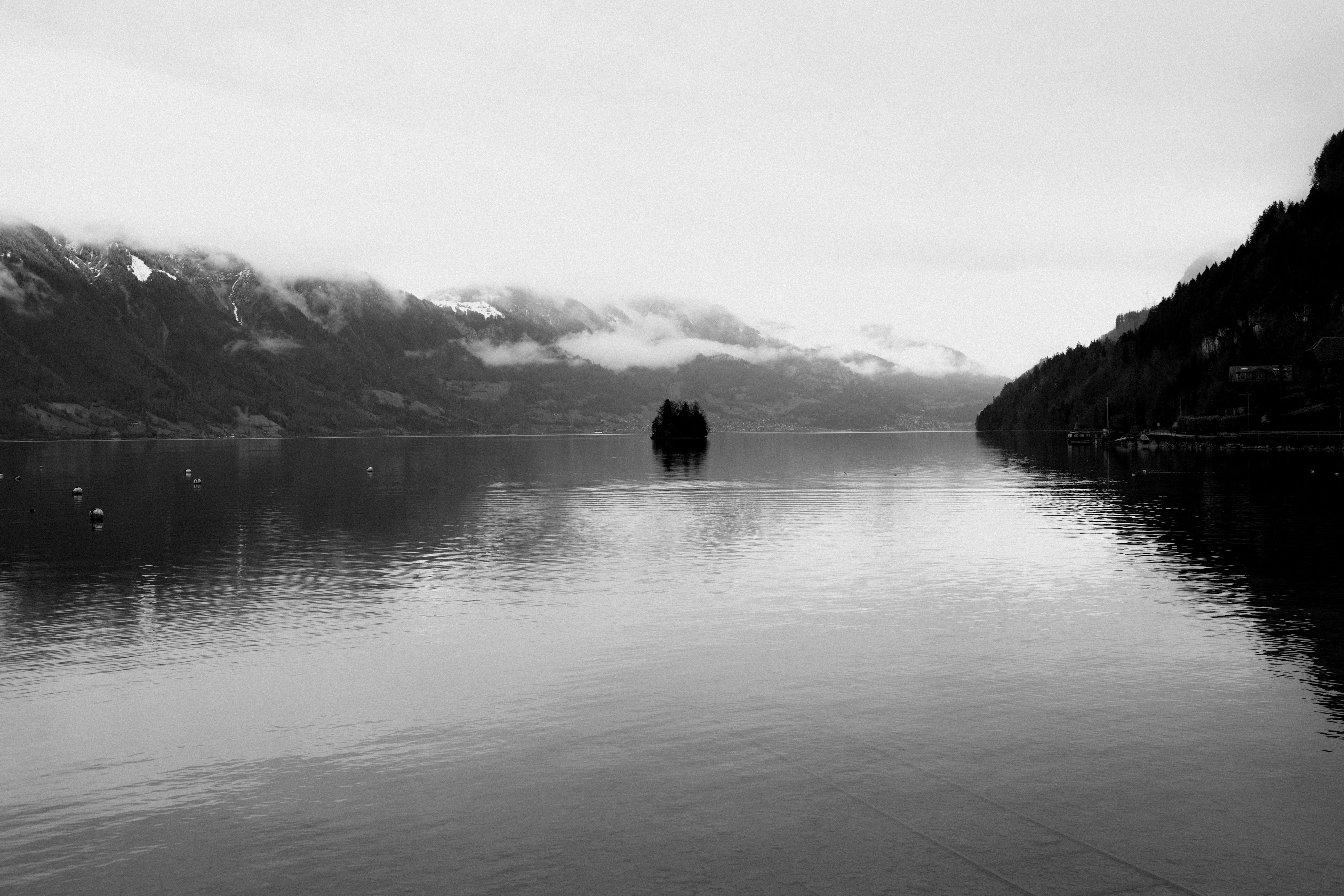 Serene Black and White Mountain Lake Panorama · Free Stock Photo