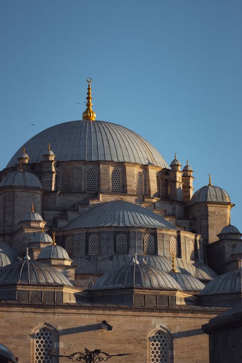 Free Close-up of a majestic Ottoman mosque dome under clear blue sky in Istanbul, Turkey. Stock Photo
