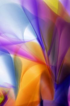 Colorful abstract art in purple, orange, and blue hues creating a dynamic visual.