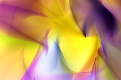 Free Dynamic abstract design featuring vibrant yellow and purple swirls, creating a sense of motion and energy. Stock Photo