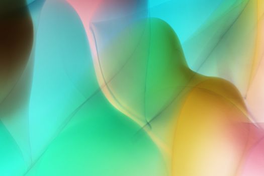 Vibrant abstract image of multicolored light waves creating a visually dynamic background.
