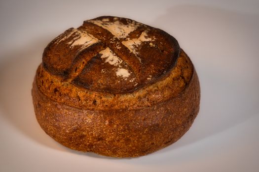 A beautifully crafted artisan bread loaf showcasing traditional baking in a Berlin bakery.