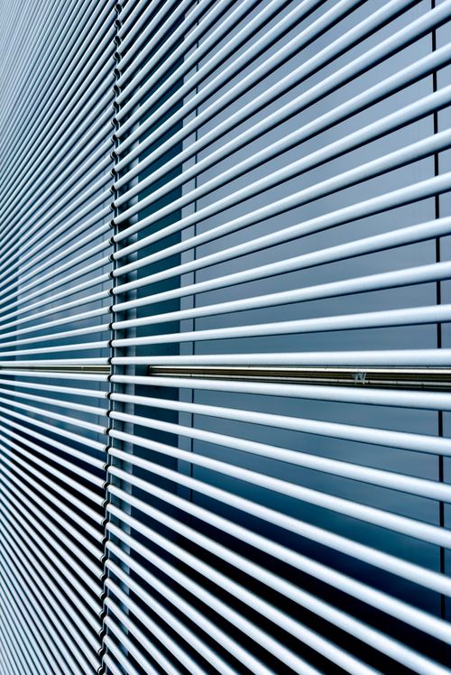 Free Abstract image of modern window blinds with straight horizontal lines and cool tones. Stock Photo