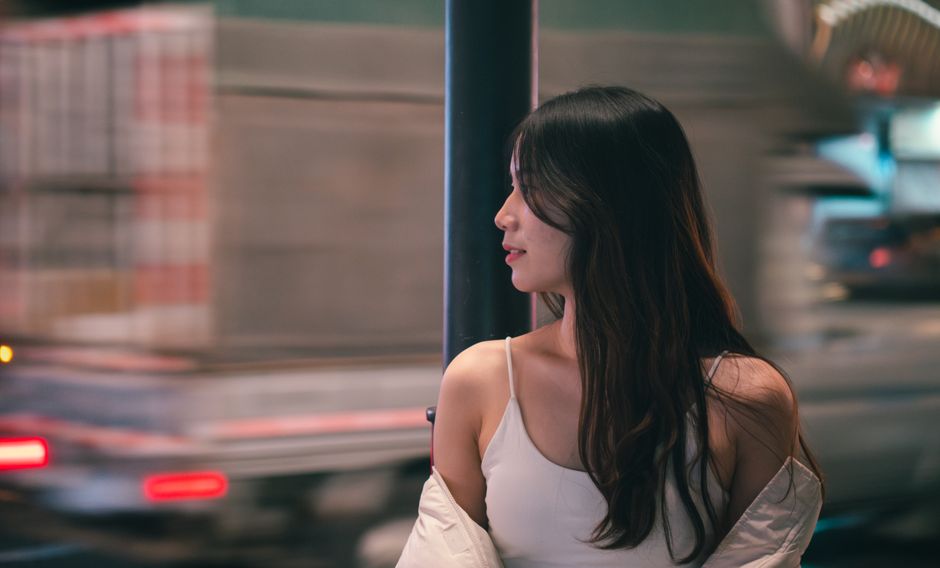 woman highway shoulder dusk