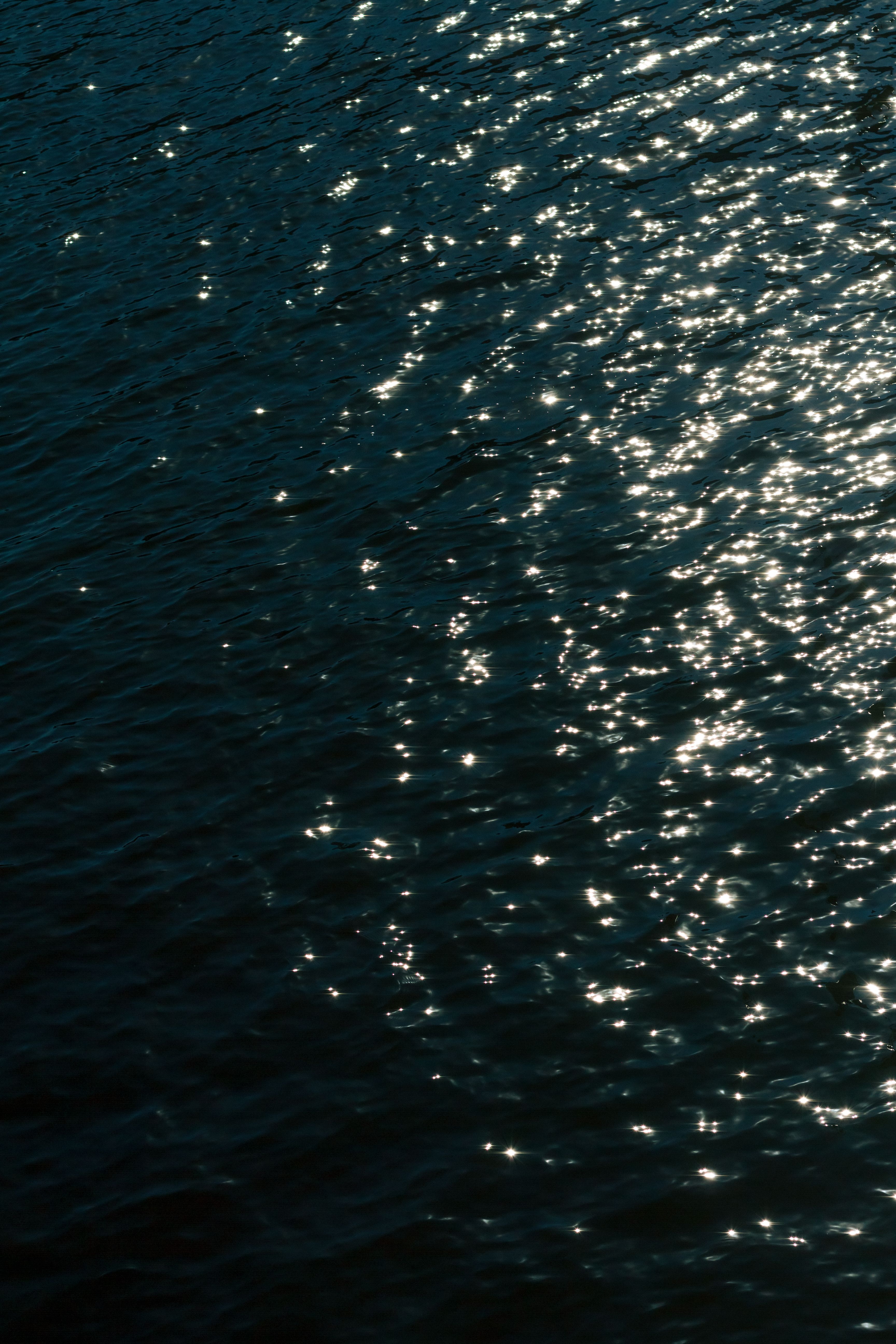 Sunlit Water Texture in Saint Petersburg · Free Stock Photo
