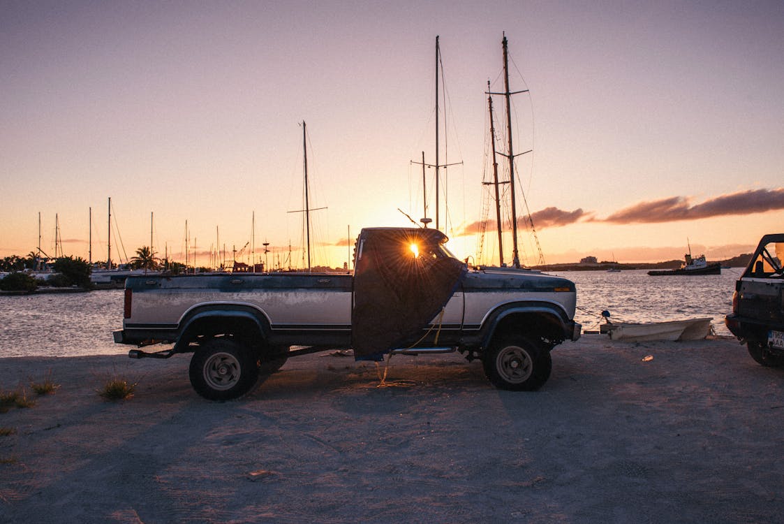 A diesel truck parked near a river