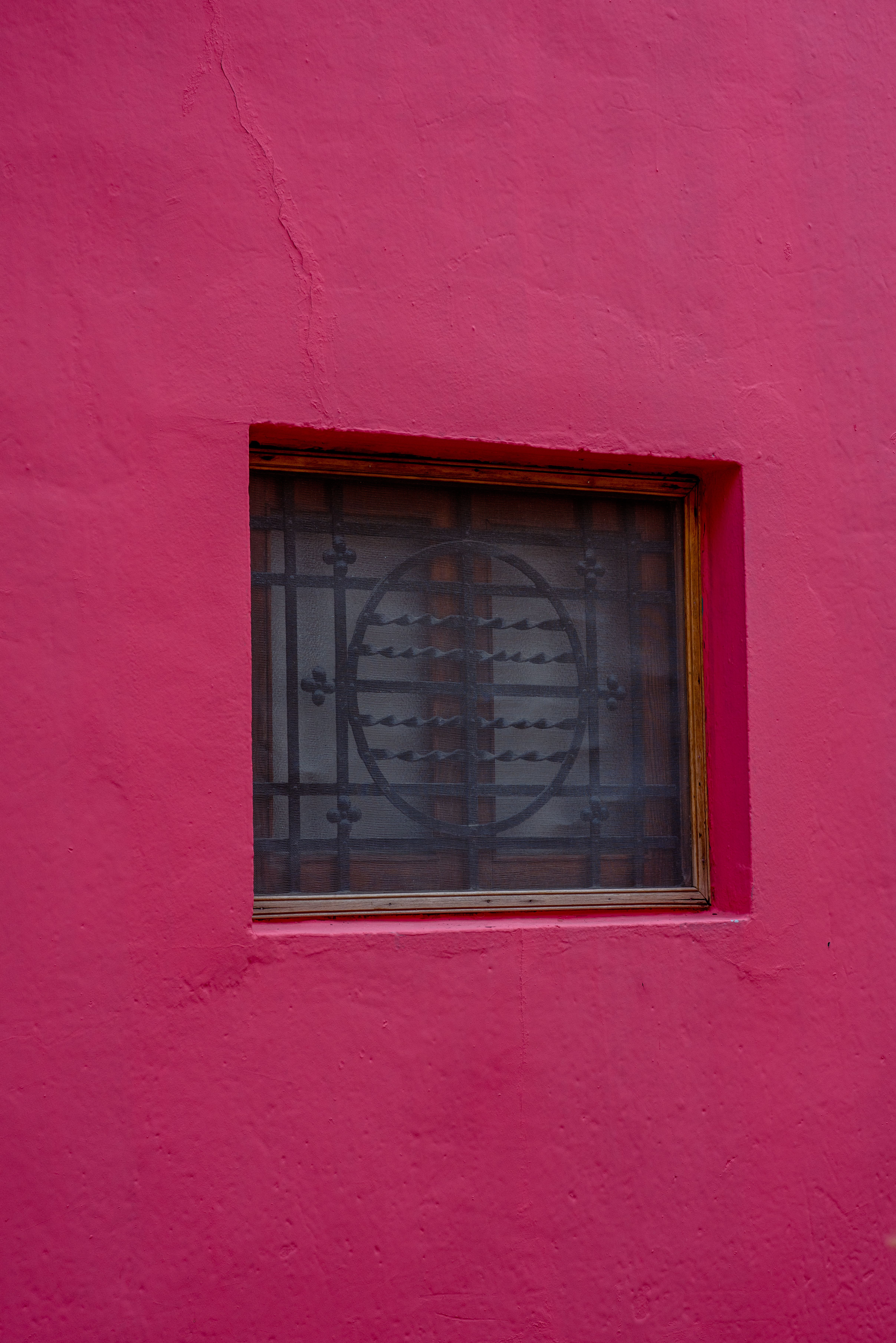 Vibrant Pink Wall with a Window · Free Stock Photo