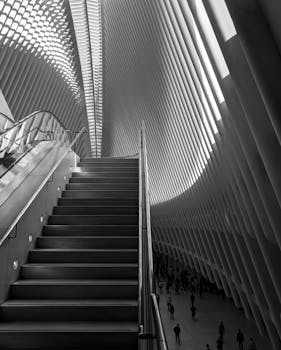 Black and white architectural photo of the Oculus interior in NYC.