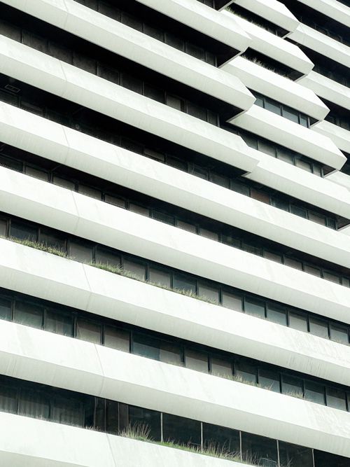 Free Abstract view of a modern building facade with windows in Amman, Jordan. Stock Photo