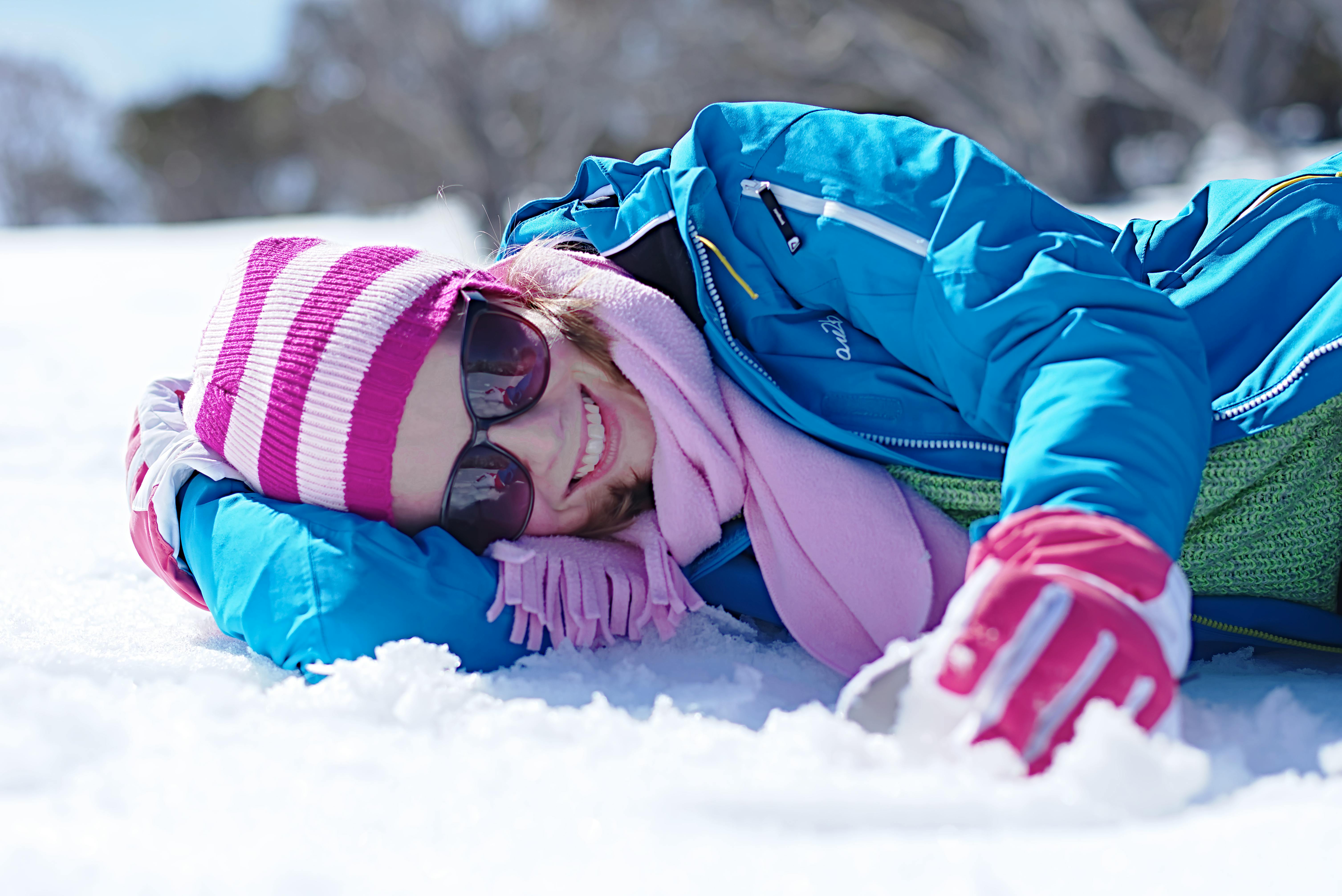 winter fun smiling woman in snowy landscape