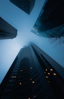Capturing the dramatic view of skyscrapers in fog, Seattle, WA.