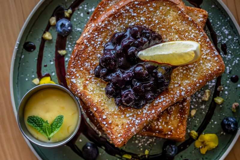 French toast topped with blueberry compote.