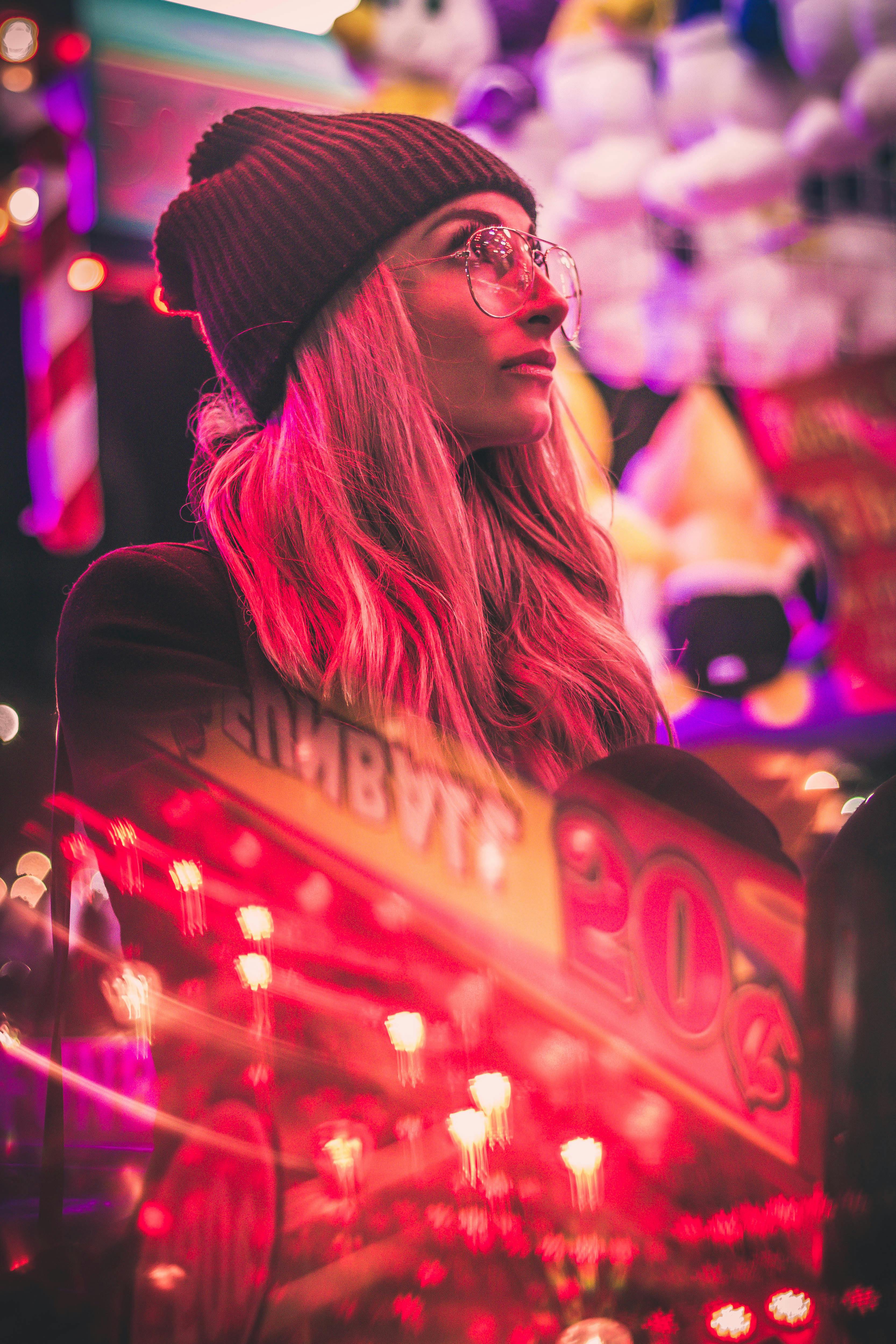 Woman wearing black knit cap and eyeglasses. | Photo: Pexels