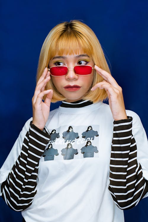 Woman Wears White and Black Crew-neck Sweater