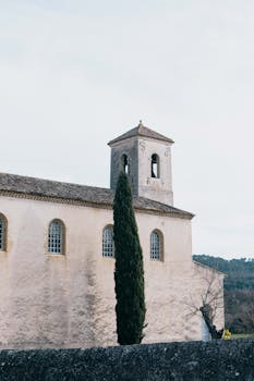 Serene view of a historic chapel in Lourmarin, showcasing Provencal architecture.