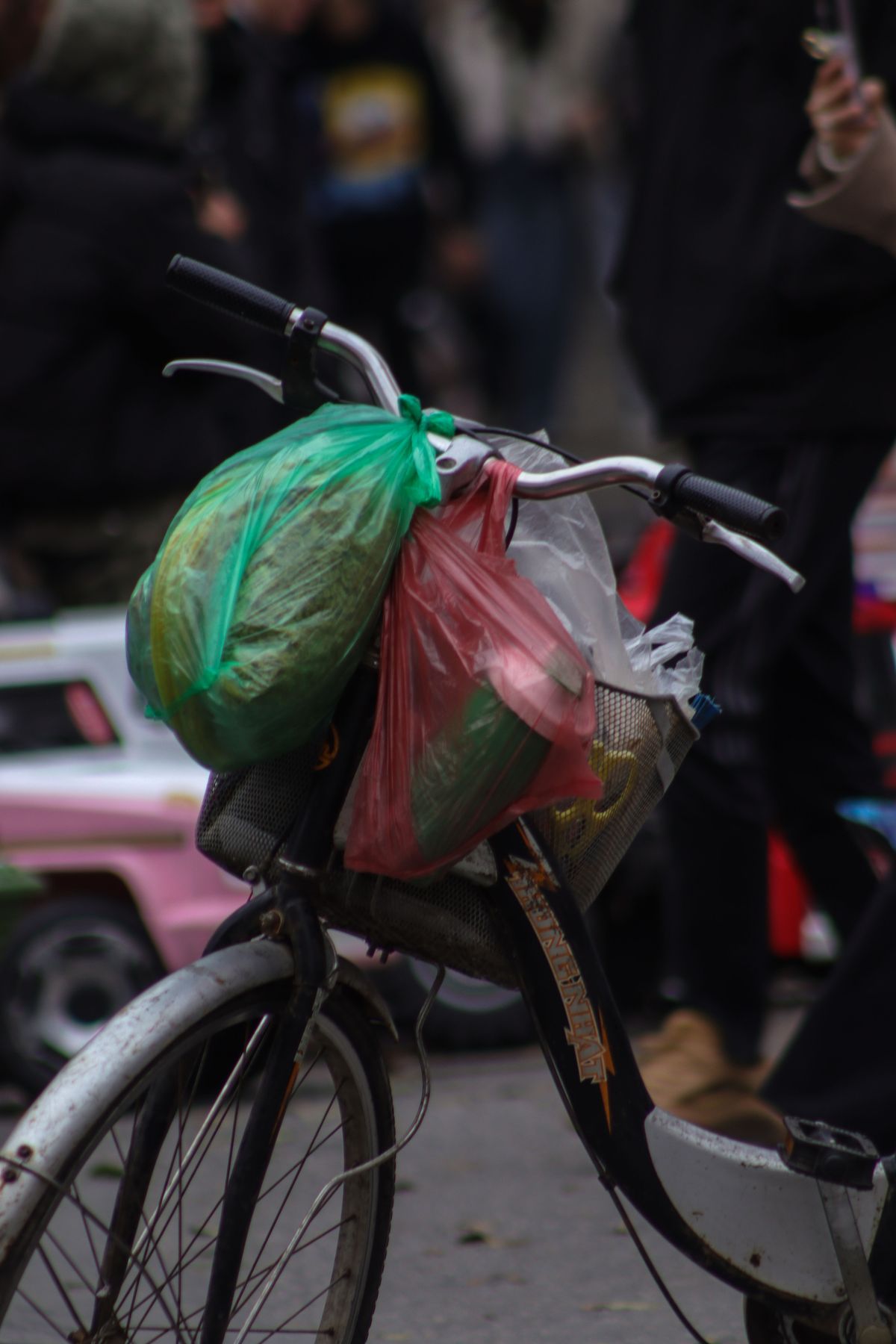 Urban bicycle carrying shopping bags on a city street