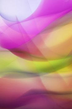 Dynamic colorful abstract wave pattern background with vibrant hues.