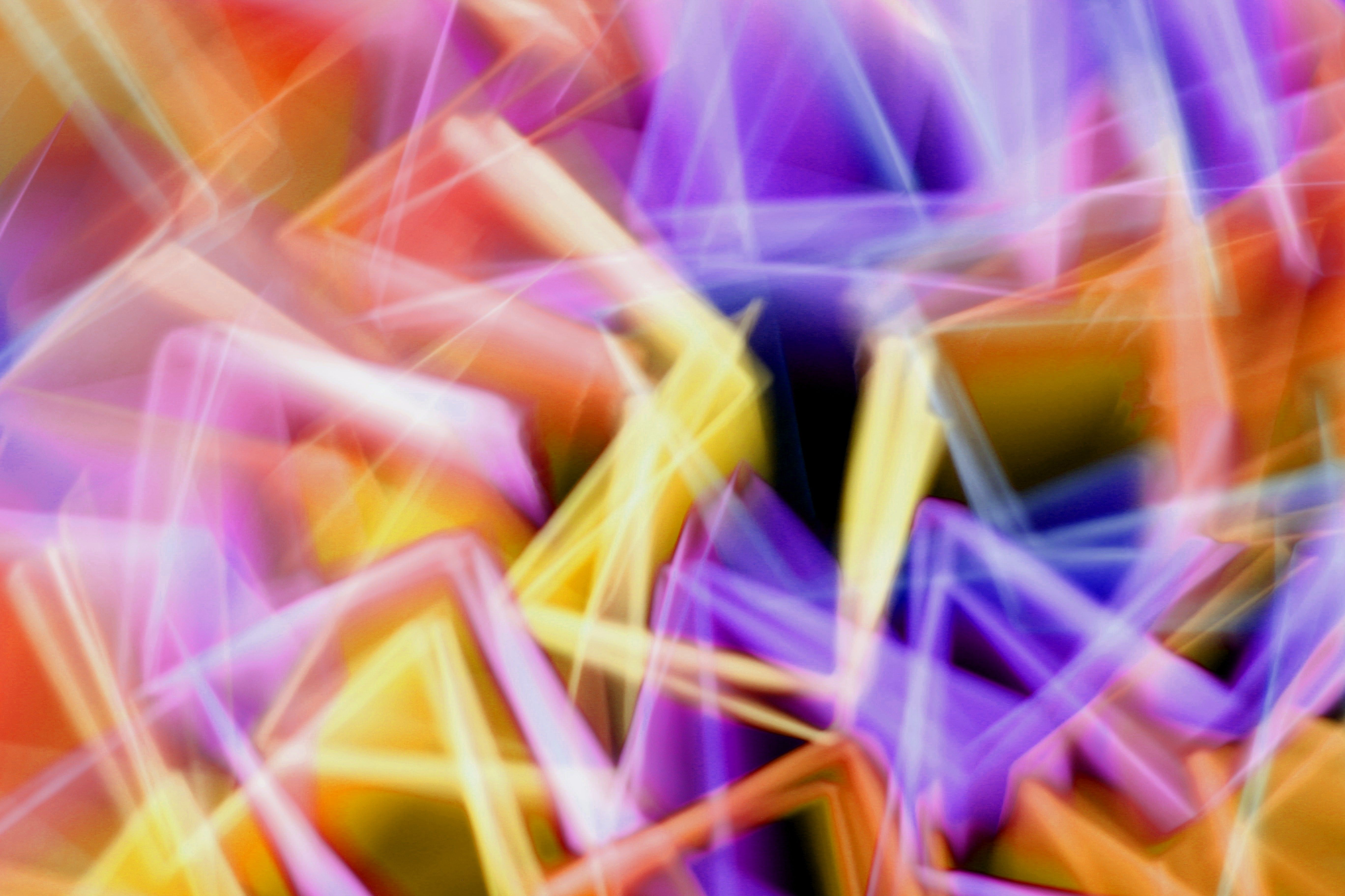 Abstract Colorful Light Trails in Geometric Patterns · Free Stock Photo