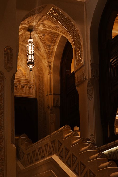Free Captivating interior with ornate arches and lighting in Muscat, Oman. Stock Photo