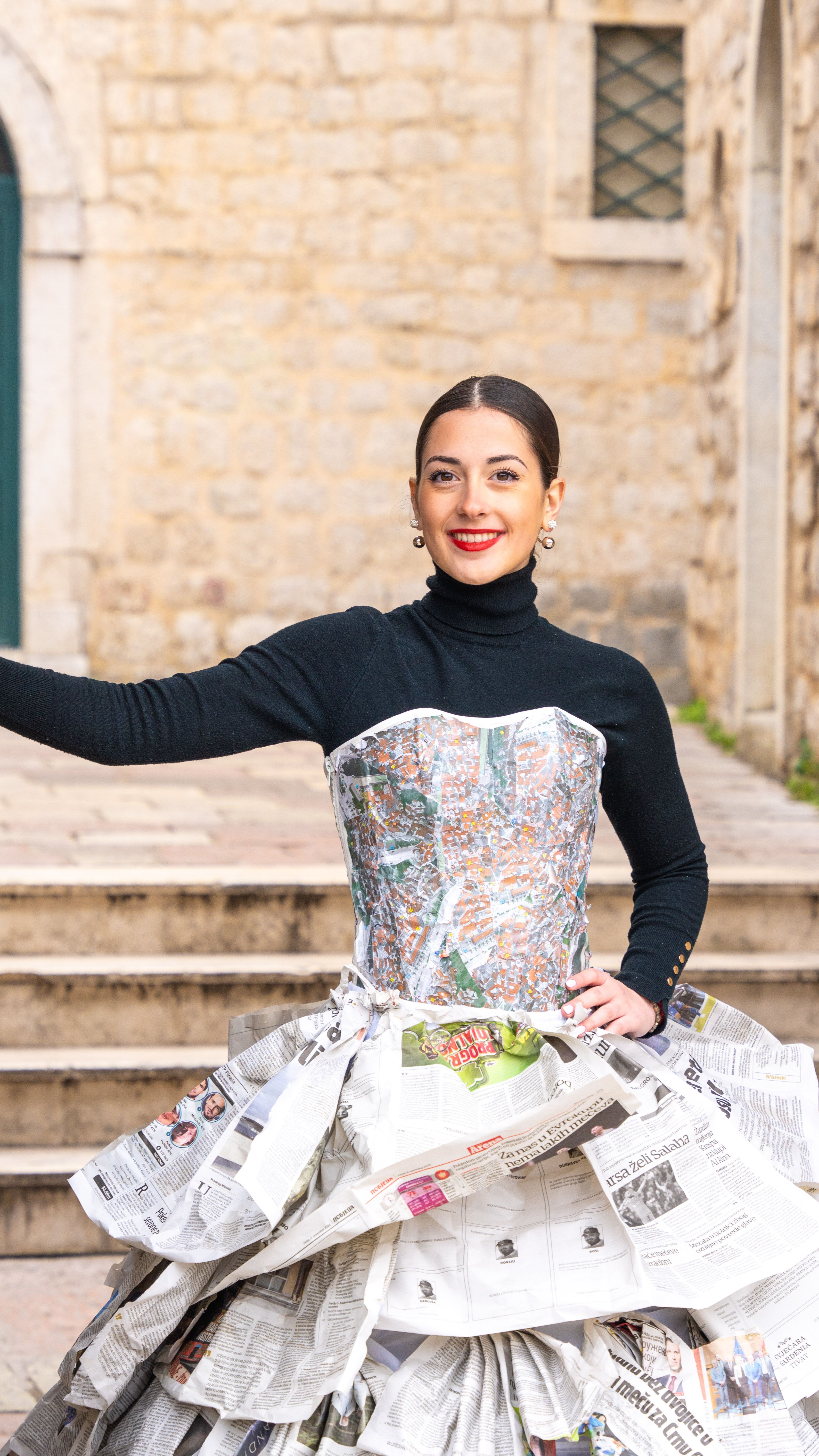 Creative fashion with recycled newspaper attire  Free Stock Photo