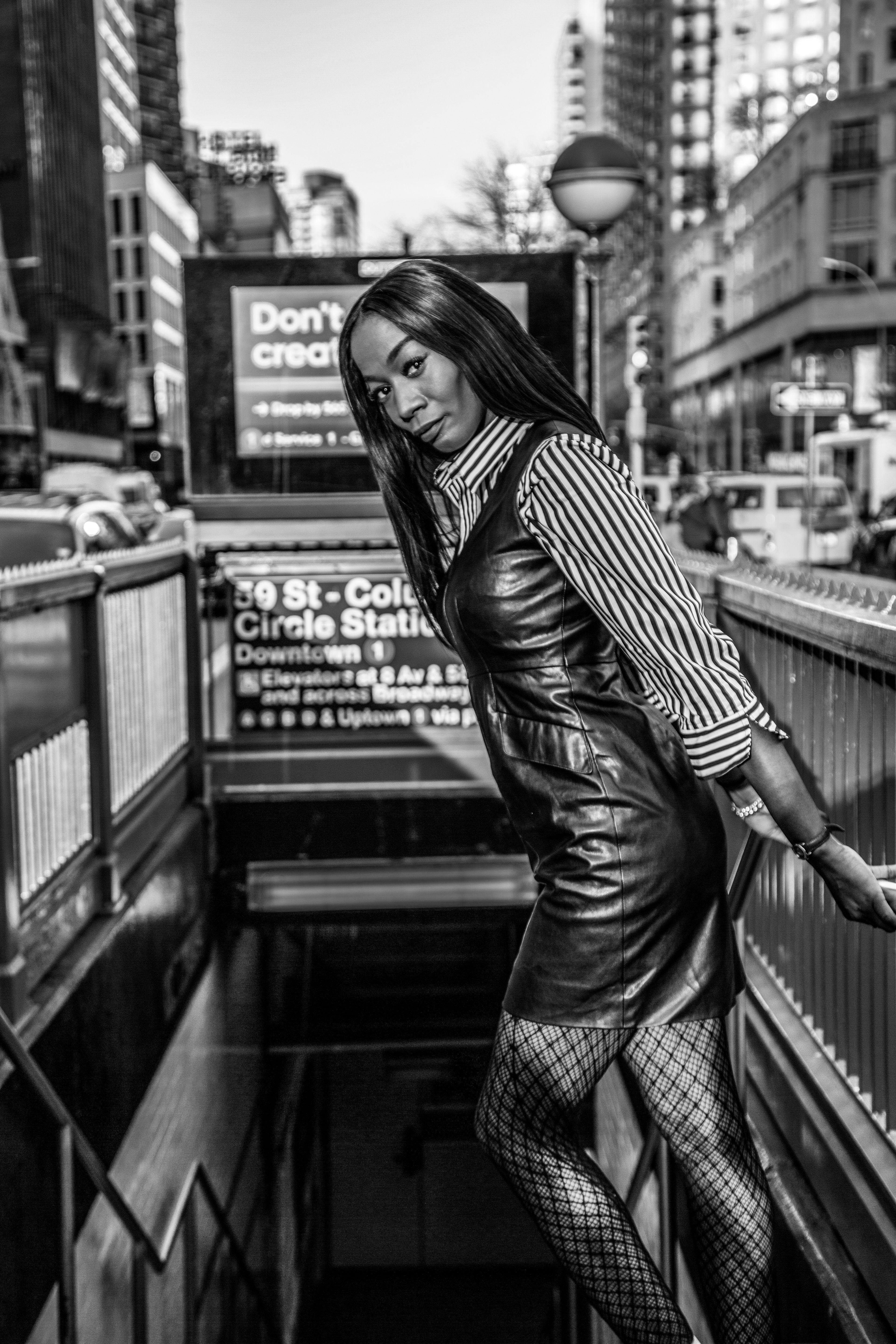 Grayscale Photo of Woman in Striped Long-sleeved Dress · Free Stock Photo