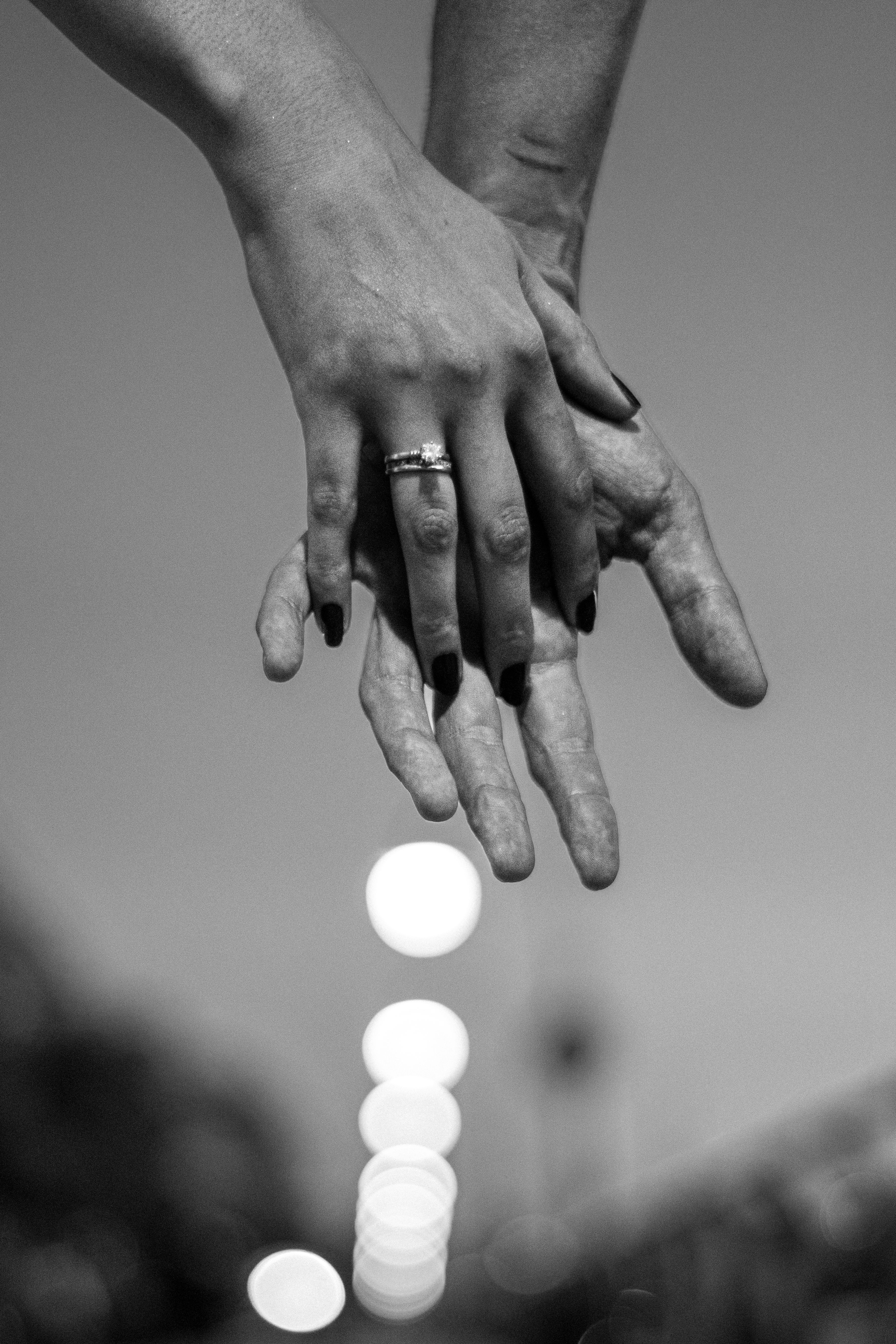 Romantic Black and White Couple Holding Hands · Free Stock Photo