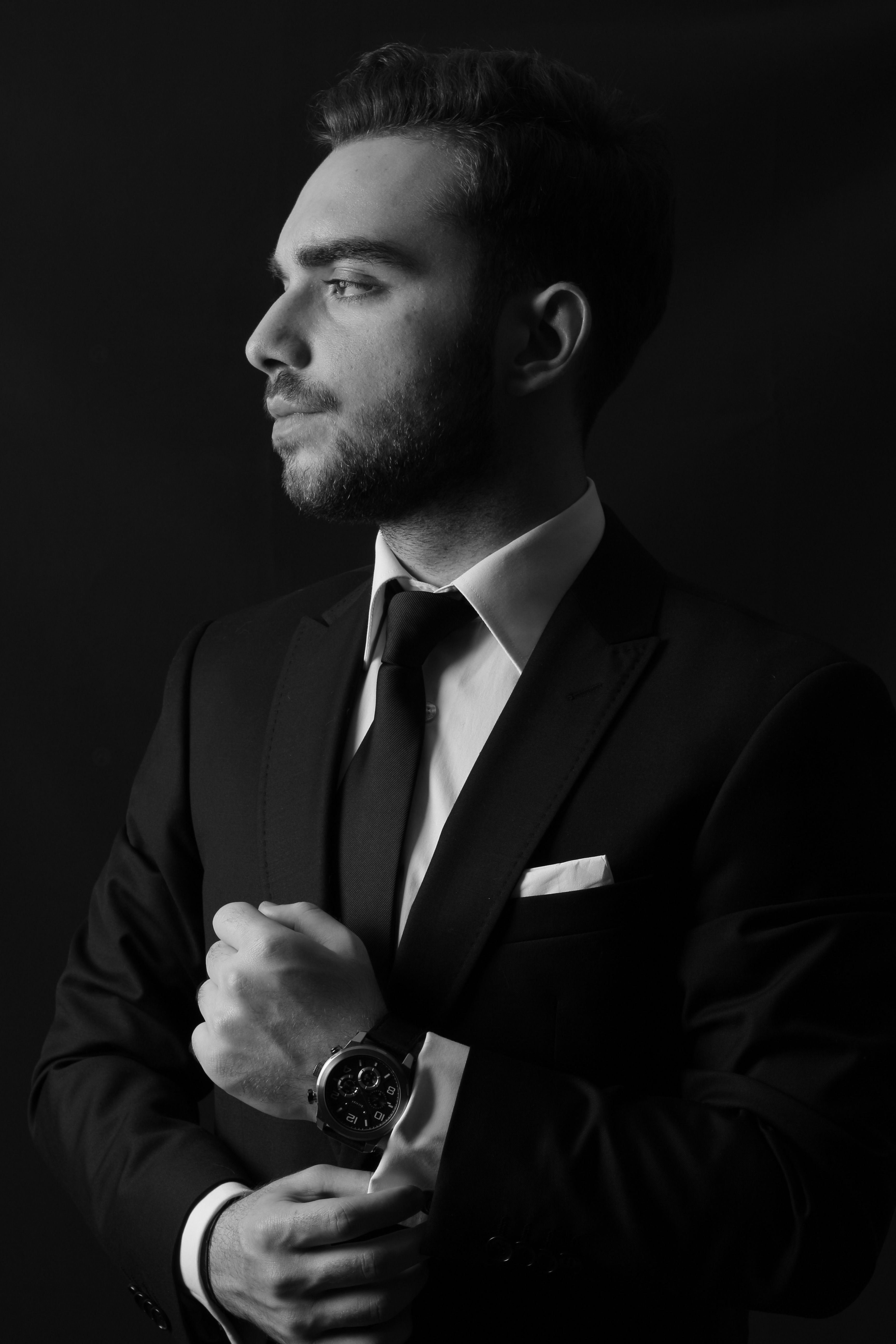 Elegant Black and White Portrait of a Man in Suit  Free Stock Photo