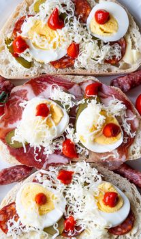 With Meat And Cheese Egg Sandwich On Wheat Bread