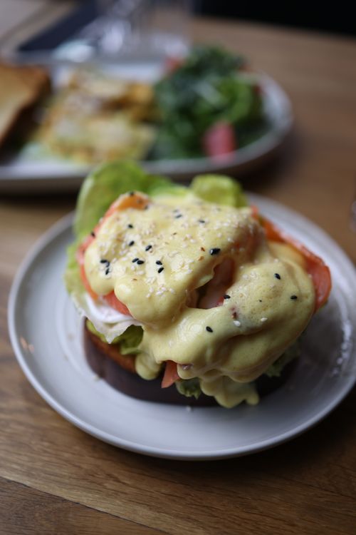 Free Appetizing open-faced sandwich with melted cheese, served fresh. Stock Photo