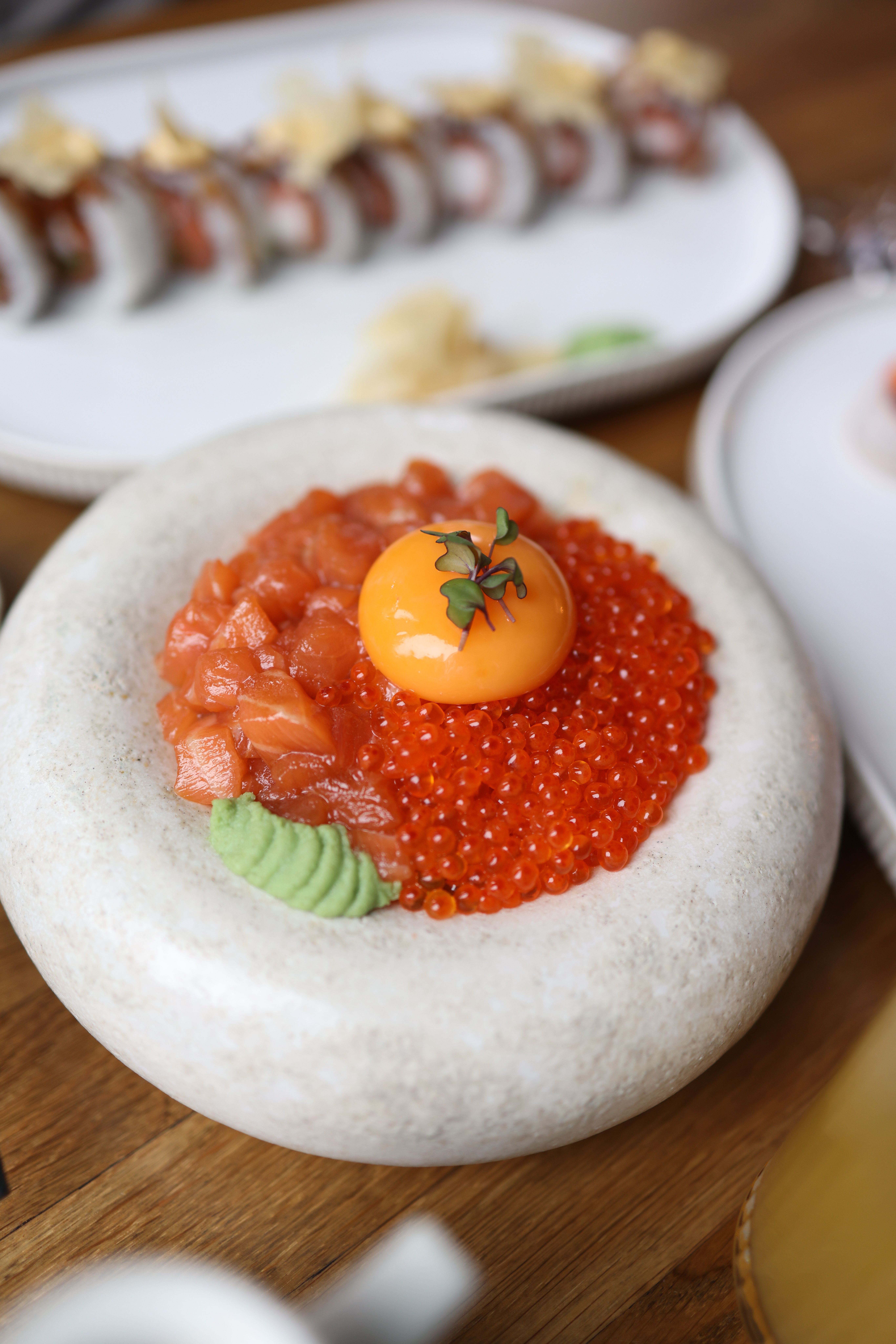 Exquisite Salmon Roe and Sushi Dish Presentation · Free Stock Photo